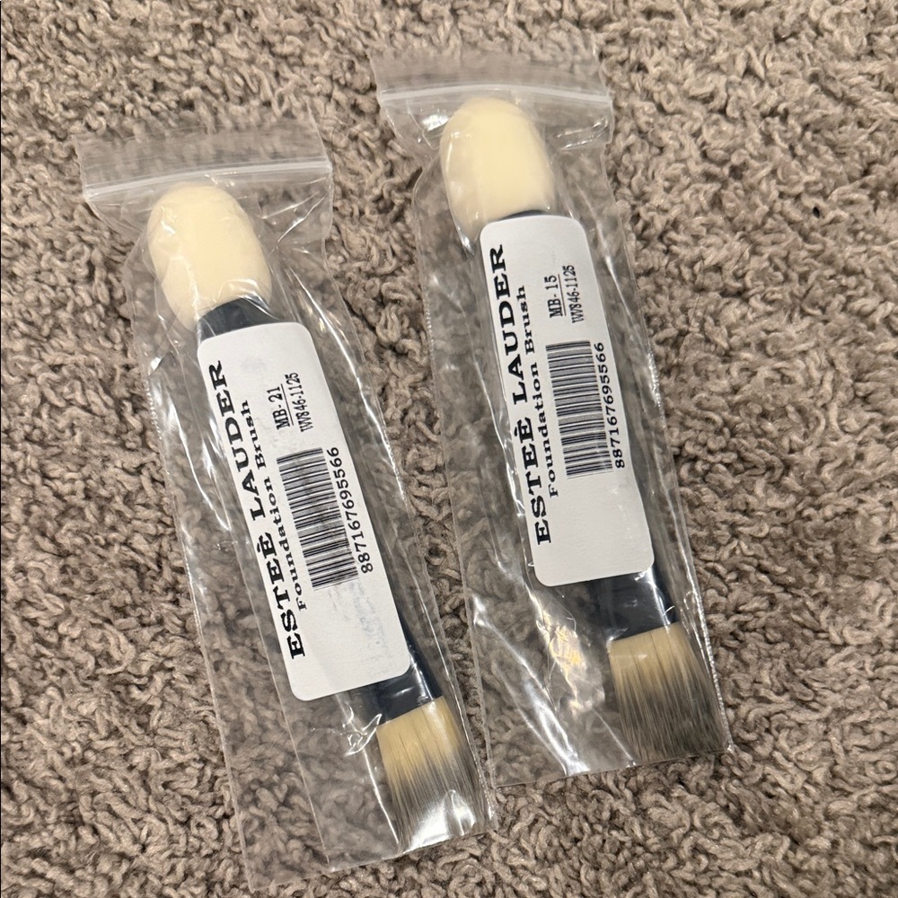 Estee Lauder Skincare Tool with Cream and Black Handle
